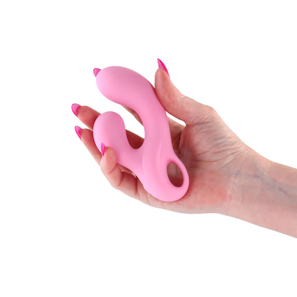 Gold-n-Dreams Agatha Rabbit Vibrator Rose Quartz held in a hand, showcasing its elegant design and dual-stimulation features.
