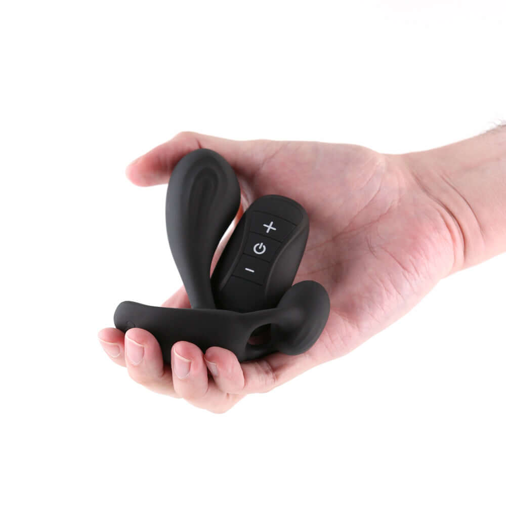 Renegade Echo Prostate Massager Black held in hand showing sleek design and remote control features.