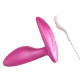 We-Vibe Ditto Plus Remote Control Vibrating Anal Plug Pink with remote, designed for comfort and deep vibrations.
