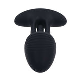 Playboy Pleasure Rim Shot 2 Anal Plug showcasing its sleek black design and unique flicking motion.