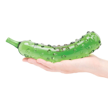 Glas Caressing Cucumber 8.25 inches Glass Dildo held in hand, textured surface and cucumber design for intimate play.