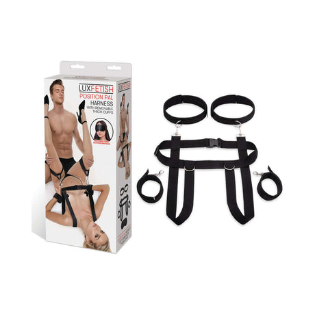 Lux Fetish Position Pal Harness with adjustable straps and thigh cuffs in packaging, designed for enhanced intimacy.