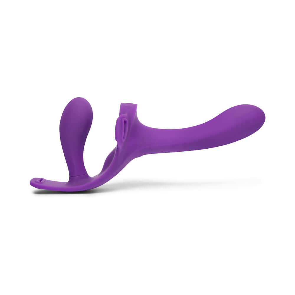 Together Lock-In Dual-Ended Vibrating Strap-on & Harness Set in vibrant purple for couples' shared pleasure.