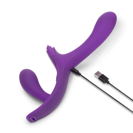 Together Lock-In Dual-Ended Vibrating Strap-on & Harness Set in vibrant purple with USB charging cable.