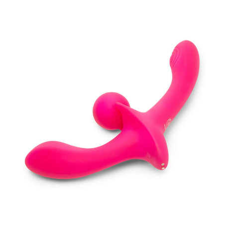 Together Double Tap Dual-Ended Vibrating Strapless Strap-on in vibrant pink, designed for shared pleasure and deep connection.