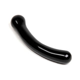 Chakrubs Xaga Curve Obsidian Wand on a white background, showcasing its smooth, glossy black surface and curved design.