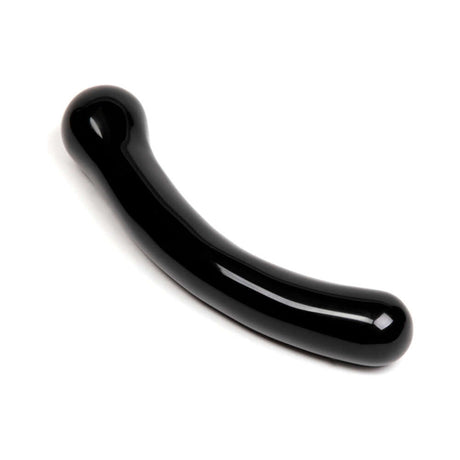 Chakrubs Xaga Curve Obsidian Wand on a white background, showcasing its smooth, glossy black surface and curved design.