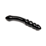 Chakrubs Xaga Viper Obsidian Wand showcasing its unique curvature and ridged design for enhanced pleasure.