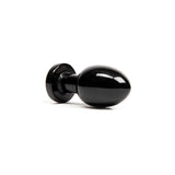 Chakrubs Xaga Root Obsidian Plug handcrafted tool for grounding and energetic balance, made from pure black obsidian.