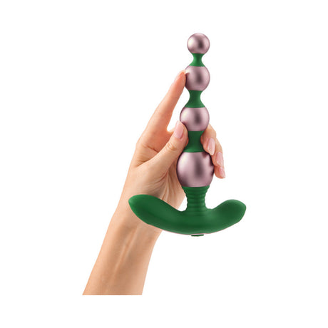 FemmeFunn Bougie Beads Rose Gold held in hand, showcasing luxurious design for anal play.