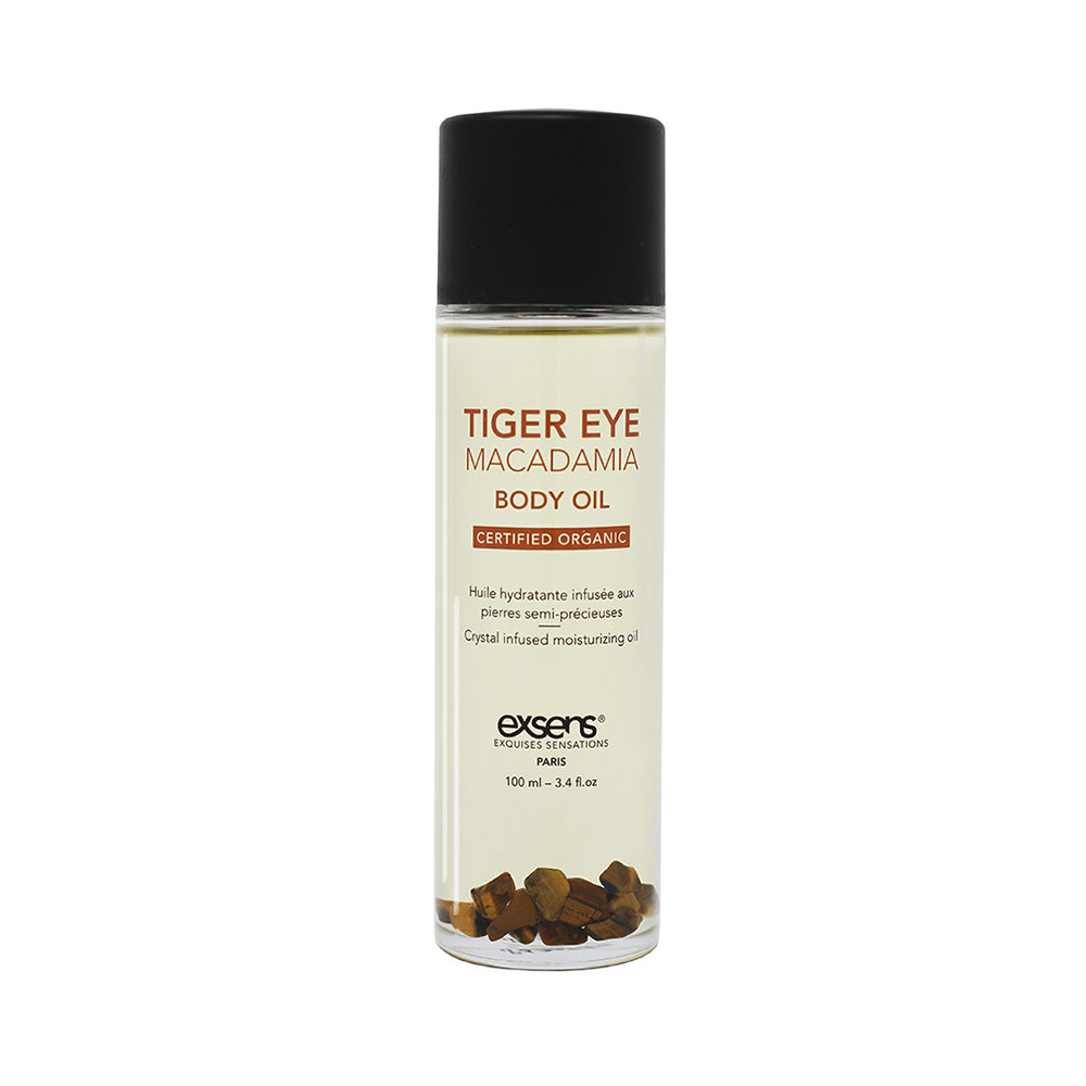 Exsens Body Oil Tiger Eye Macadamia 3.4 Oz bottle with a sleek design, showcasing the luxurious body oil.
