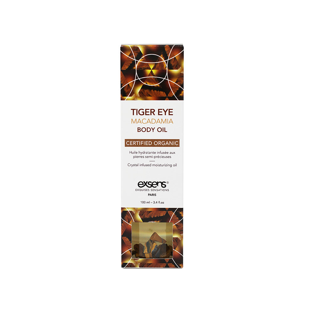 Exsens Body Oil Tiger Eye Macadamia 3.4 Oz packaging with organic label and crystal-infused design.