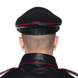Back view of Prowler Red Military Cap Black Red 59 cm Large worn with leather attire.
