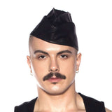 Prowler RED Triangle Cap Black 57cm Medium worn by a model, showcasing a stylish leather look.