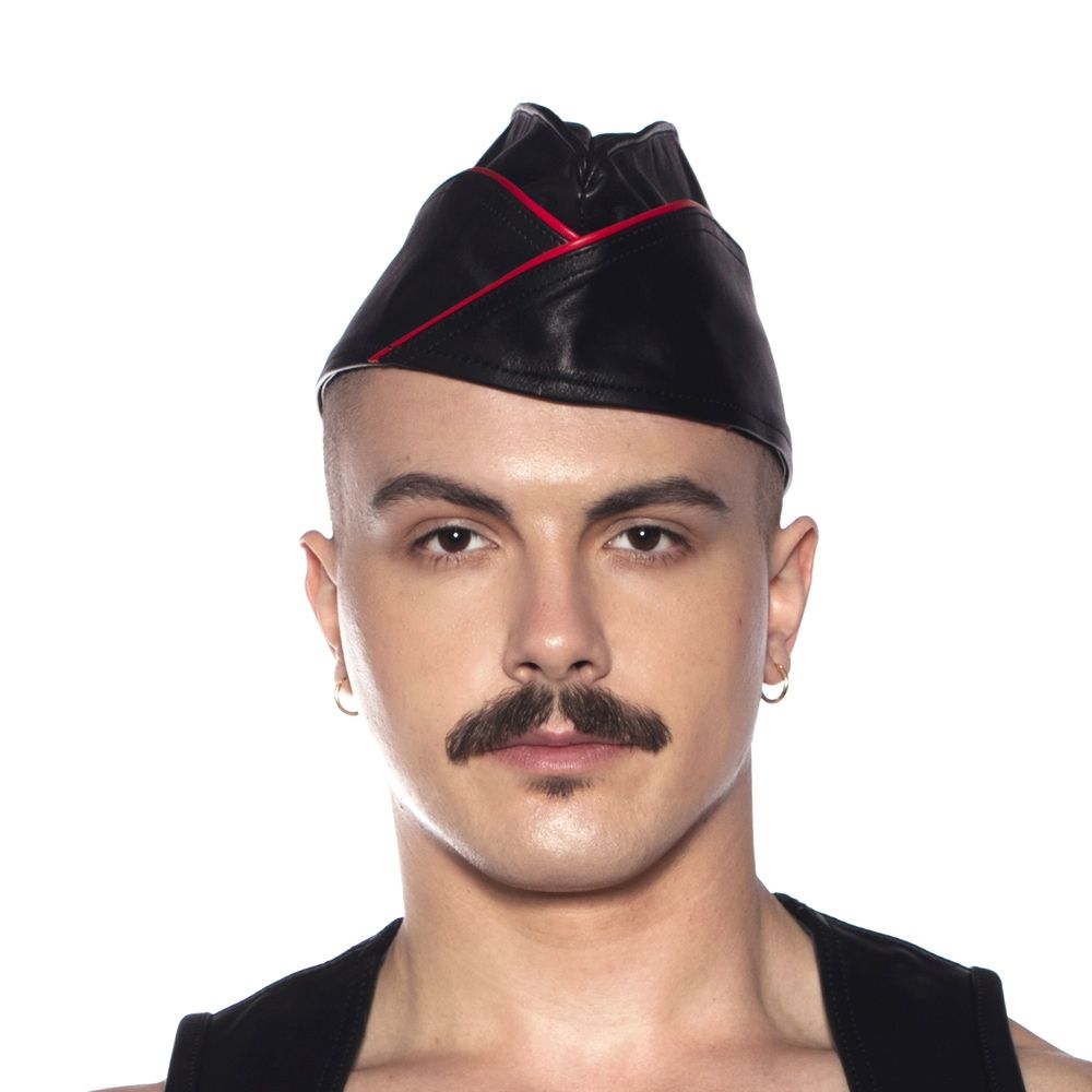 Prowler Red Triangle Cap Black Red 55 cm Small worn by a model, showcasing its bold and stylish design.