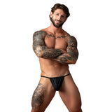 Male Power Kilauea Limited Edition G-String Black One Size styled on a muscular model showcasing tattoos.