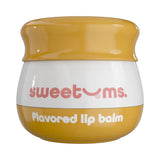 Sweetums Flavored Lip Balm Mango jar with a glossy yellow finish and labeled branding for hydration and flavor.
