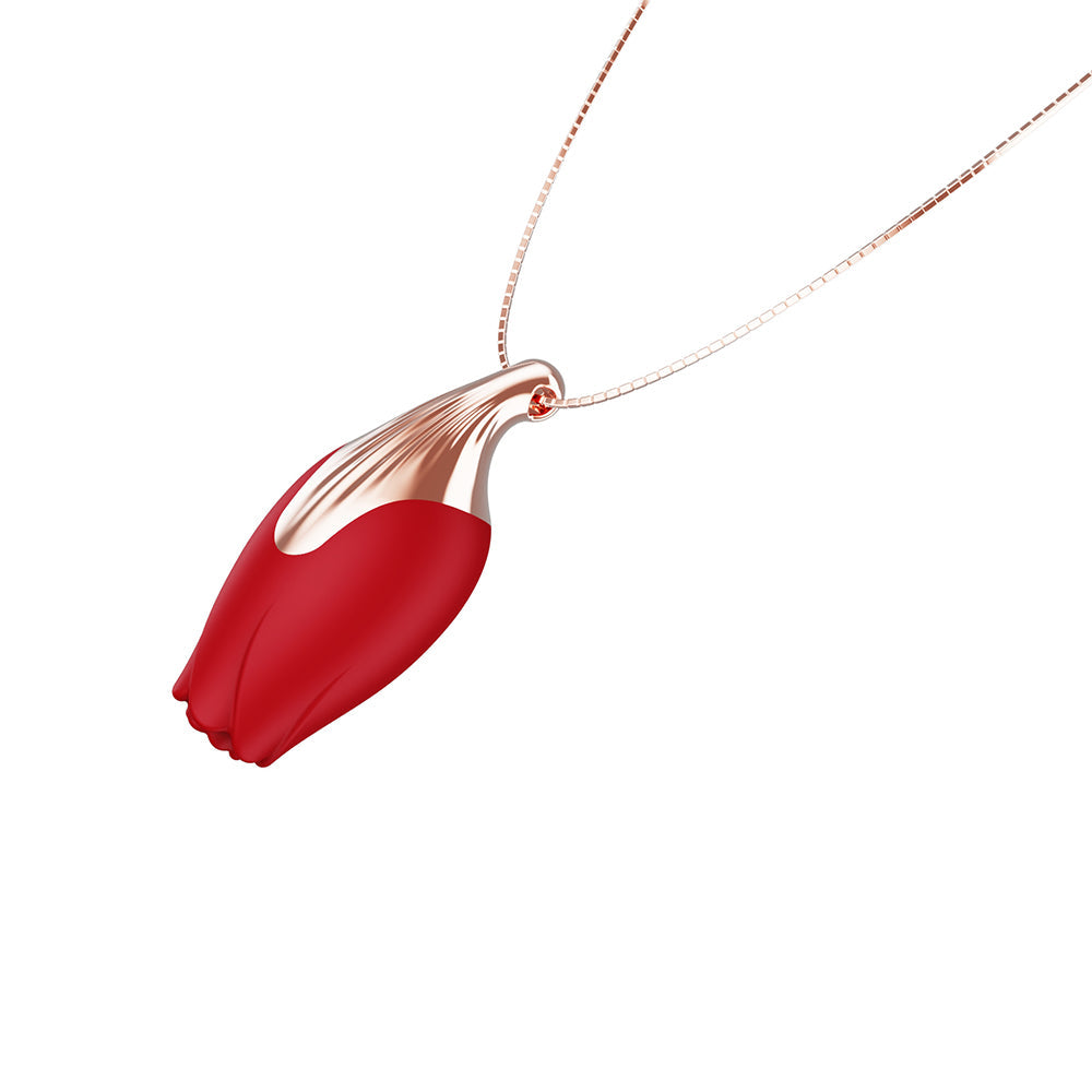 The Pleasure Company Patina Vibrating Rose Necklace in red with rose gold chain, elegant and discreet.
