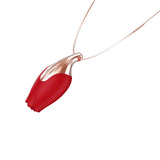 The Pleasure Company Patina Vibrating Rose Necklace in red with rose gold chain, elegant and discreet.