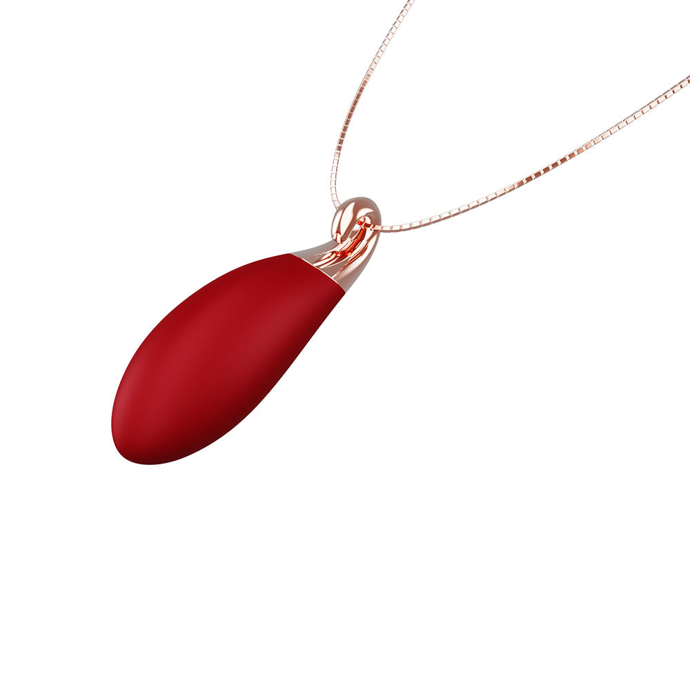 The Pleasure Company Ruby Vibrating Necklace shown, a discreet wearable vibrator designed as elegant jewelry.
