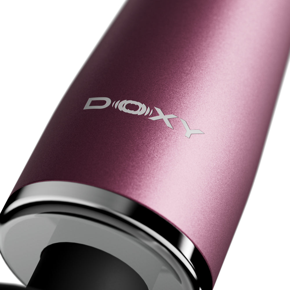 Close-up of the Doxy Go Travel-sized Wand Massager Pink showcasing its sleek anodized aluminum finish.