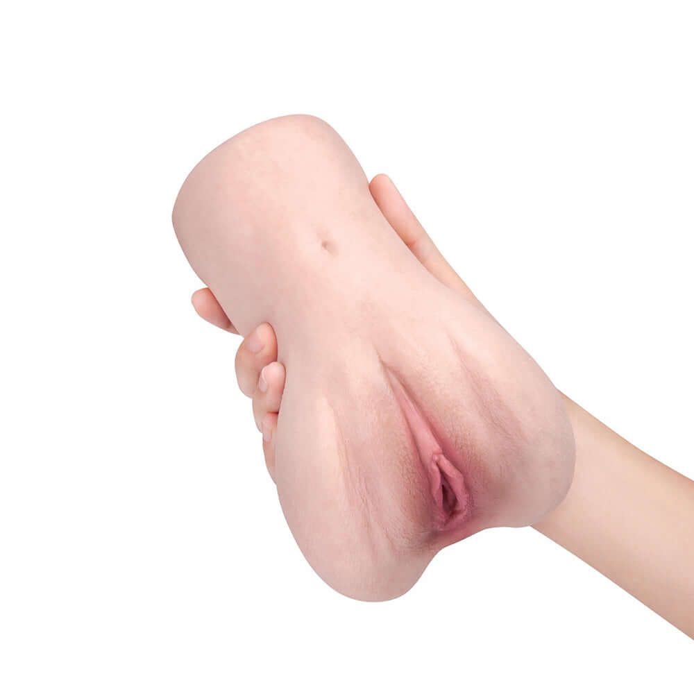 Me You Us Male Masturbator Stroker 2-Hole Silicone held in hand showcasing its realistic design.