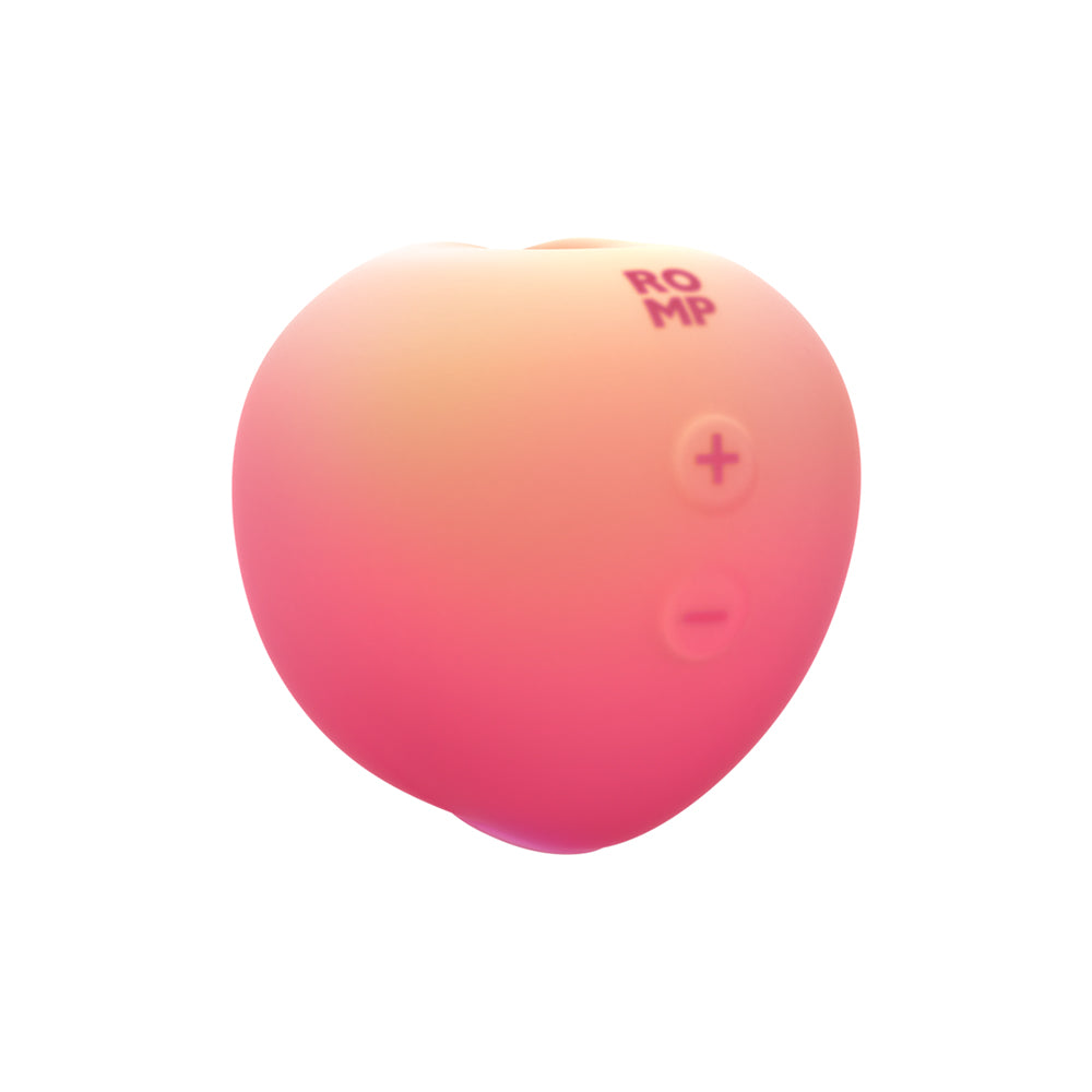 Romp Pink Peach Air Suction Clitoral Stimulator displayed from the front, featuring a playful peach-inspired design.