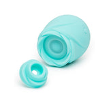 Romp Glow Air Suction Rose Massager in soft blue silicone with removable head for customizable stimulation.