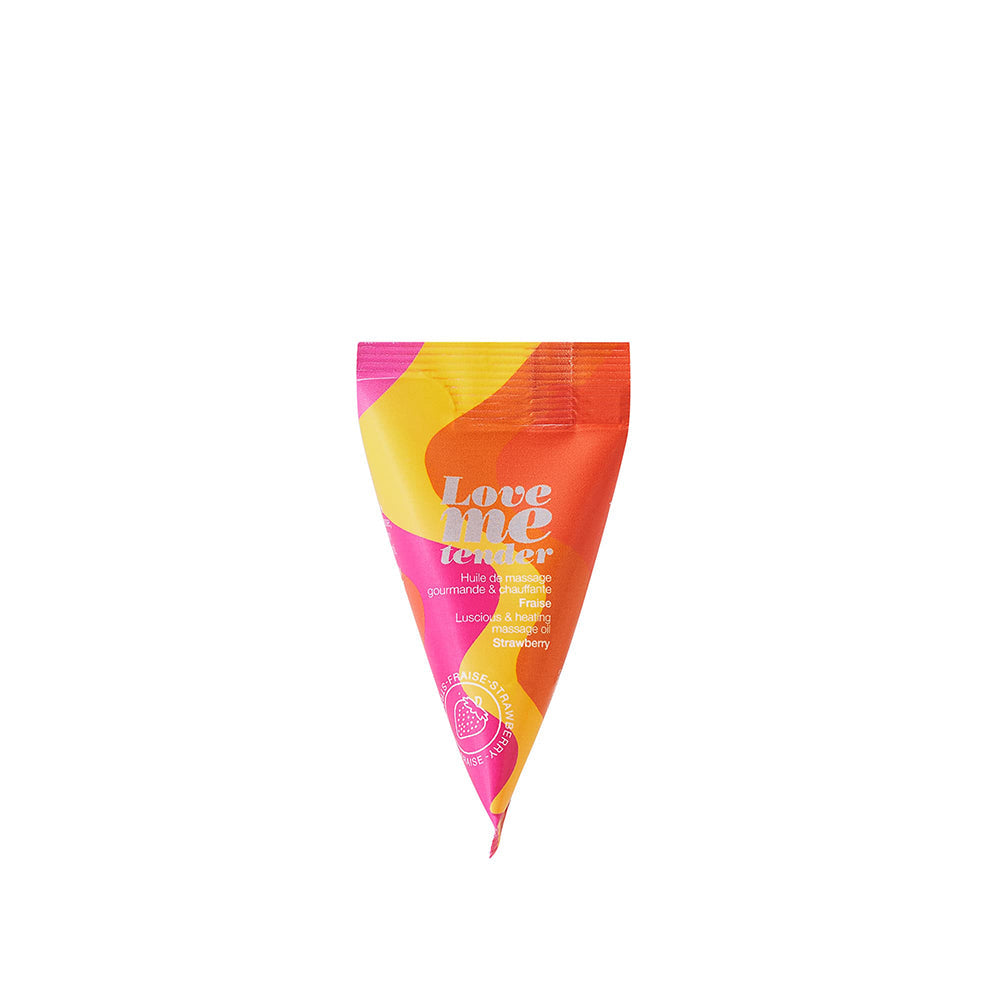 Love Me Tender Strawberry Heating Massage Oil packaging for sensual massages and intimate moments.