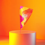 Love Me Tender Strawberry Heating Massage Oil packaging on a vibrant background, highlighting its sensual appeal.