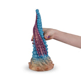 Camtoyz Fantasy Dildo Vortex held in hand, featuring artistic tentacle design in vibrant colors.