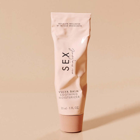 Sex Au Naturel Vulva Balm Soothing Moisturizer tube on a minimalist background
