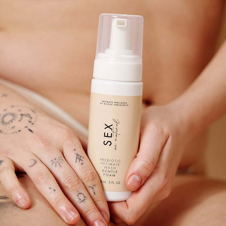 Sex Au Naturel Prebiotic Intimate Wash Gentle Foam held in hands, promoting gentle care for delicate skin.