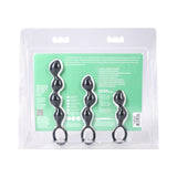 Mood Naughty Contour Beads Trainer Set Black with three graduated butt plugs in packaging.