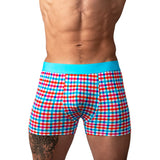 Male Power So Cumfy Gingham Boxer Brief Turquoise M displayed on a model, featuring vibrant turquoise gingham pattern.