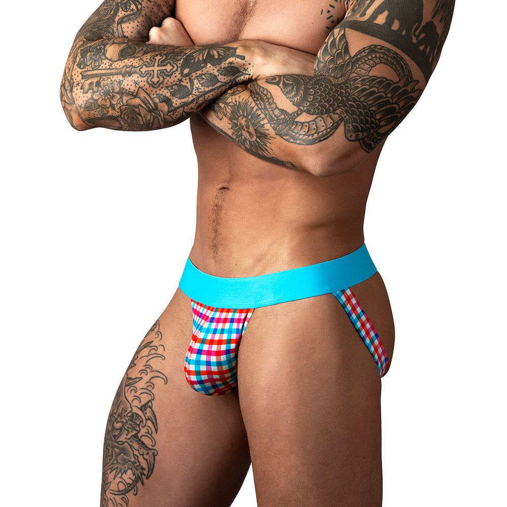 Male Power So Cumfy Gingham Jock Turquoise L XL on a model with tattoos, showcasing stylish comfort and athletic support.