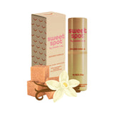Sweetums Sweet Spot Flavored Fragrance Golden Vanilla in a stick with packaging and vanilla flower.