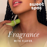 Sweetums Sweet Spot Flavored Fragrance Golden Vanilla solid fragrance stick being applied.