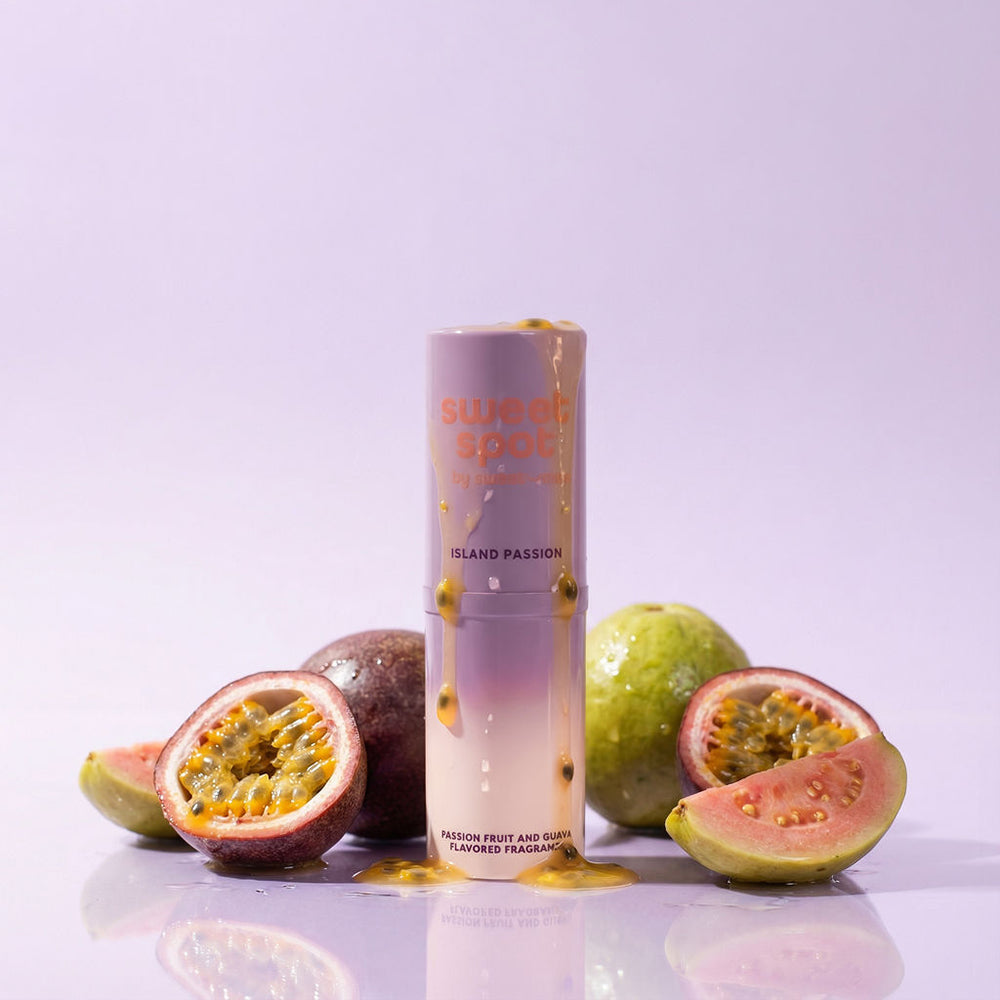 Sweetums Sweet Spot Flavored Fragrance Island Passion with passion fruit and guava on a pastel backdrop.
