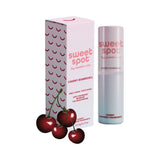 Sweetums Sweet Spot Flavored Fragrance Cherry Bombshell with cherries and packaging.