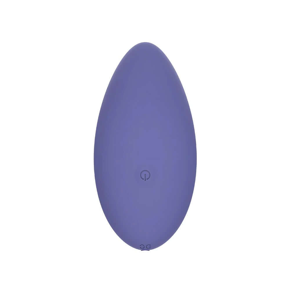 Spectrum Essentials Compact External Vibrator Purple showcased in its ergonomic, pebble-shaped design.