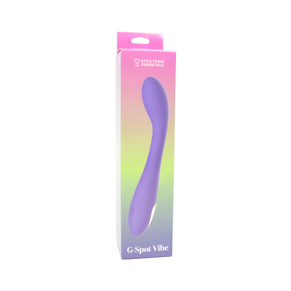 Spectrum Essentials Silicone G-spot Vibrator Purple in packaging, showcasing its curved design and ergonomic shape.