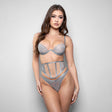 Fantasy Lingerie Elusive Mila Bra Cincher Thong Set S/M displayed on a model, showcasing delicate lace and sheer mesh designs.