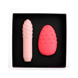 Je Joue Double Trouble Vibrator Set featuring pink and red compact vibrators in a sleek box.