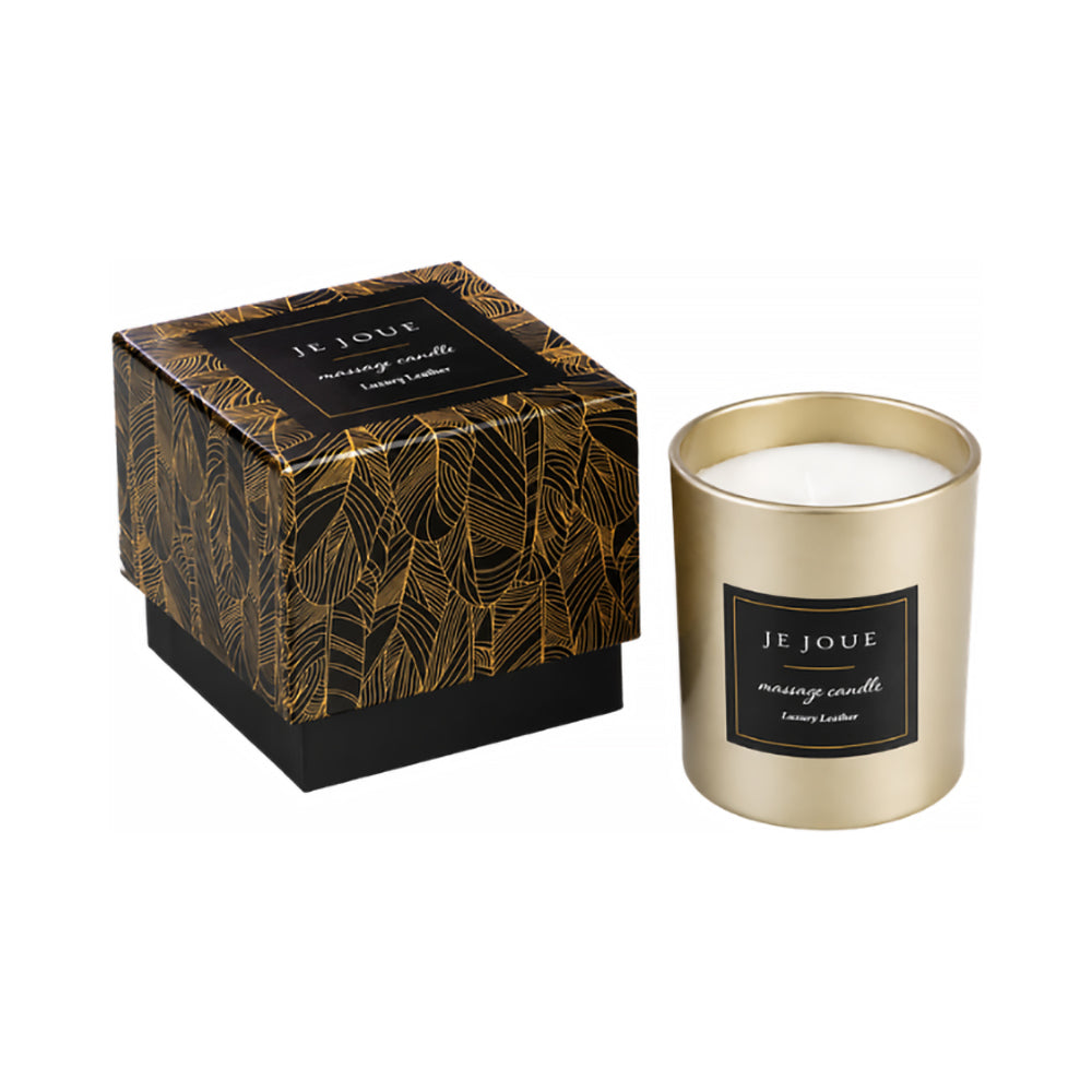 Je Joue Luxury Leather Massage Candle 160g in gold container with stylish packaging on display.