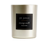 Je Joue Luxury Leather Massage Candle 160g in an elegant gold holder, perfect for a sensual evening.