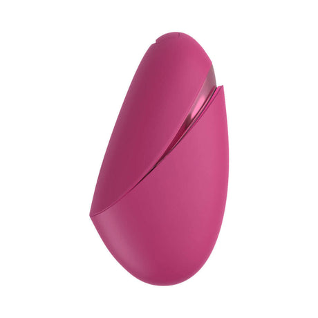 Womanizer Next Liberty Air Clitoral Massager Vibrant Pink in a sleek and compact design, perfect for travel and discreet pleasure.