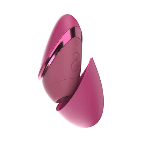 Womanizer Next Liberty Air Clitoral Massager Vibrant Pink in a stylish design with a sleek travel cap.