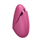 Womanizer Next Liberty Air Clitoral Massager Vibrant Pink in a sleek and compact design.