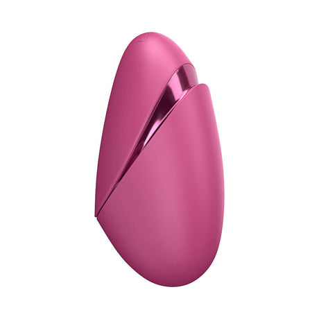 Womanizer Next Liberty Air Clitoral Massager Vibrant Pink in a sleek and compact design.